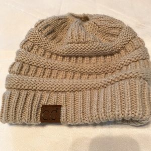 Beige knit cap with hole for ponytail